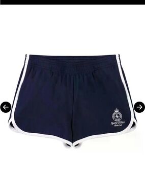 Sporty & Rich Women’s Small Embroidered Blue Tennis Shorts